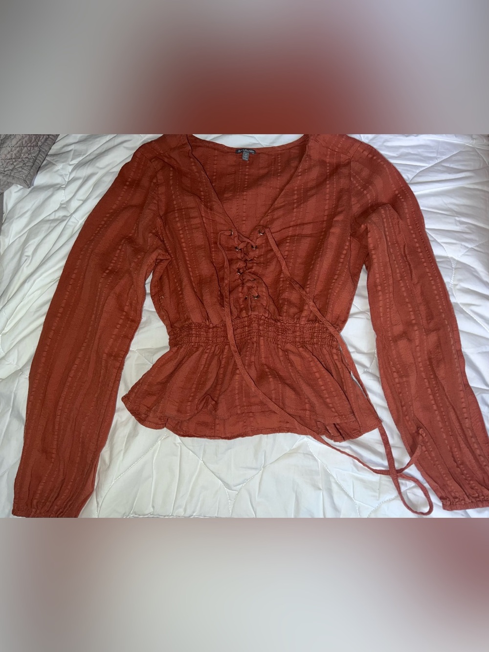lace up rust peplum top
